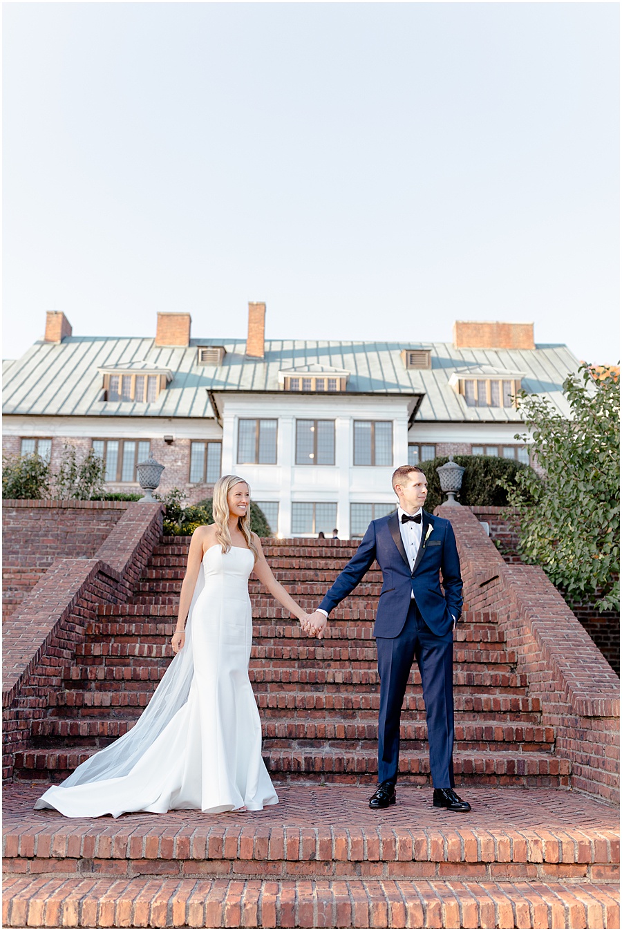 bride and groom on leading brick staircase