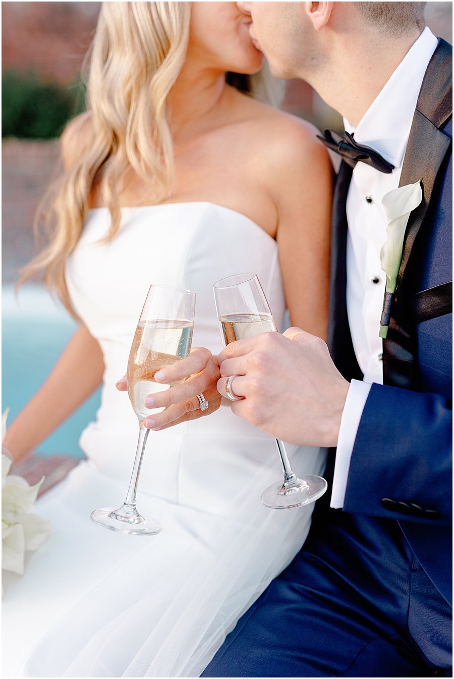 wedding rings and champagne flutes 